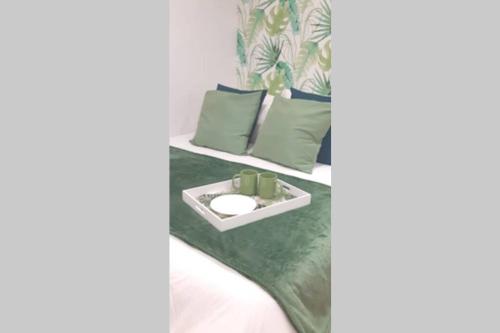 a room with a bed with a tray on it at Apartamento vista al mar Playa Las Américas in Arona