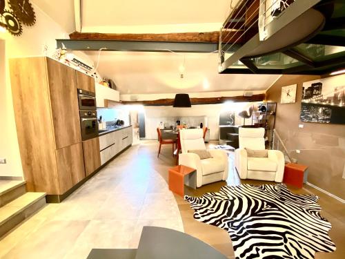 a living room with a zebra rug on the floor at ABCdecor Italia in Imperia