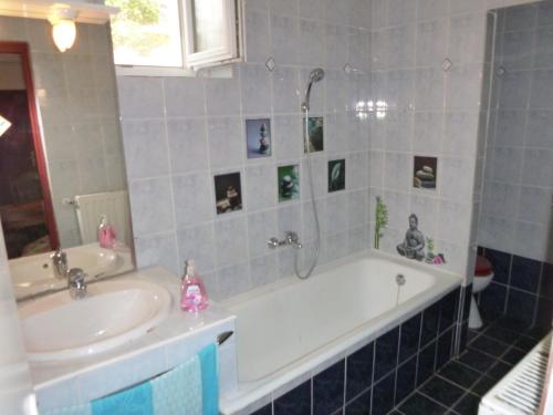 Kúpeľňa v ubytovaní Lugas Apartman