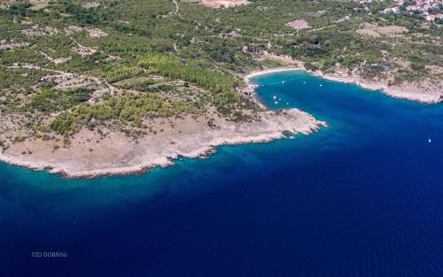 an aerial view of an island in the ocean at Apartments Olivia & Navy, Šilo in Šilo