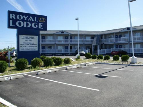 a hotel parking lot in front of a building at Royal Lodge in Absecon
