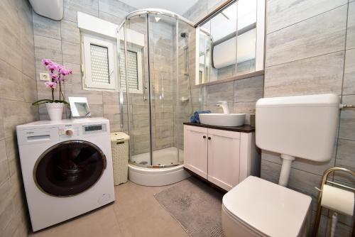 Koupelna v ubytování Apartmani Rudius