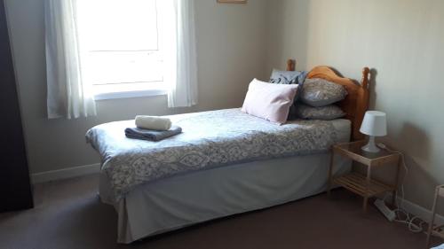 En eller flere senge i et værelse på 39 Gravir, Isle of Lewis