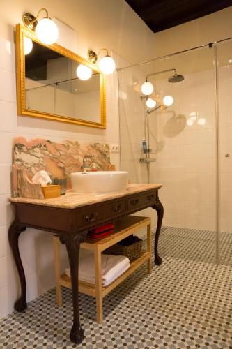a bathroom with a sink and a shower at Renaissancehof Wieser Wachau in Wösendorf
