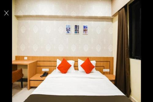 En eller flere senge i et værelse på Hotel Golden - I