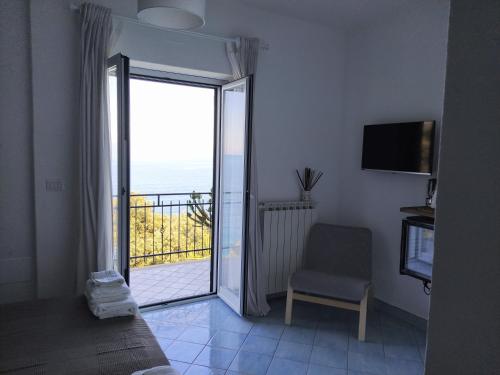 TV a/nebo společenská místnost v ubytování Judia Camere sul mare