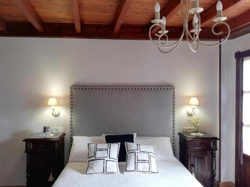 Säng eller sängar i ett rum på La Quintana de Doña Leonor