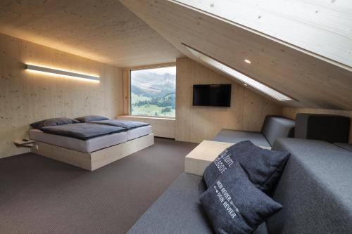 TV a/nebo společenská místnost v ubytování Revier Mountain Lodge Adelboden