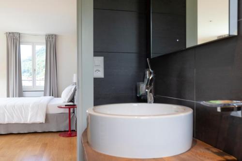Postel nebo postele na pokoji v ubytování Lac Hotel