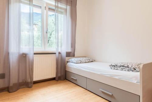 Ένα ή περισσότερα κρεβάτια σε δωμάτιο στο appartamento casa stefi n1