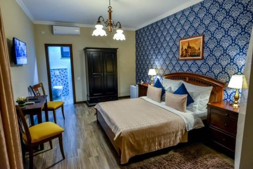 Ένα ή περισσότερα κρεβάτια σε δωμάτιο στο Villa Boutique Alina