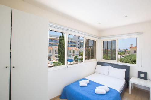 Llit o llits en una habitació de Delfini Villas