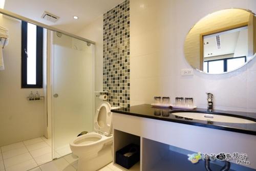 Koupelna v ubytování CHEN FENG HOMESTAY