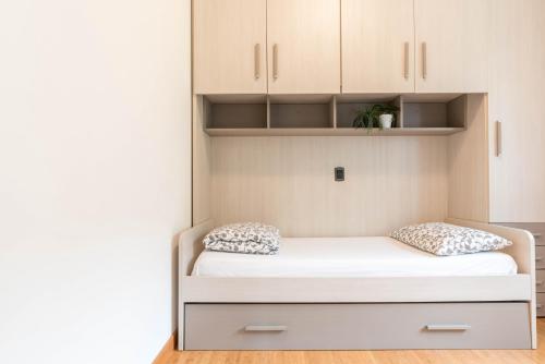 Ένα ή περισσότερα κρεβάτια σε δωμάτιο στο appartamento casa stefi n1