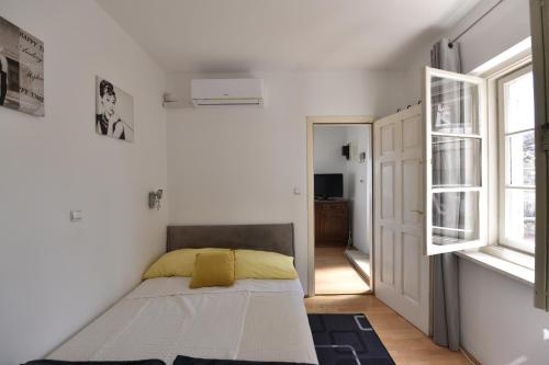 Posteľ alebo postele v izbe v ubytovaní The Dream On Apartment