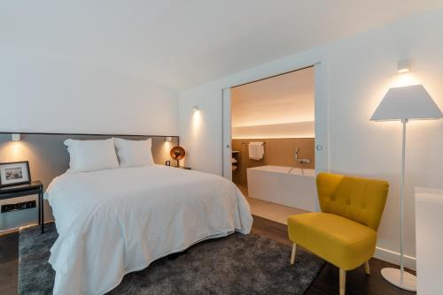 Un ou plusieurs lits dans un hébergement de l'établissement B5 Loft Duplex 175Blo-Paris Convention