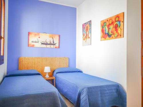 Кровать или кровати в номере CASE COLOMBO E MATTARELLA- Appartamenti centrali con wi-fi e parcheggio privato gratuito