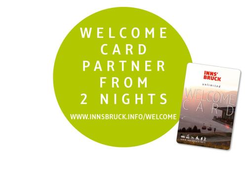 two books with the text welcome card partner from nights at Hotel Garni Schieferle in Innsbruck
