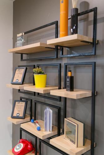 a shelf with some items on it at Hotel Mercure Toulouse Centre Compans in Toulouse