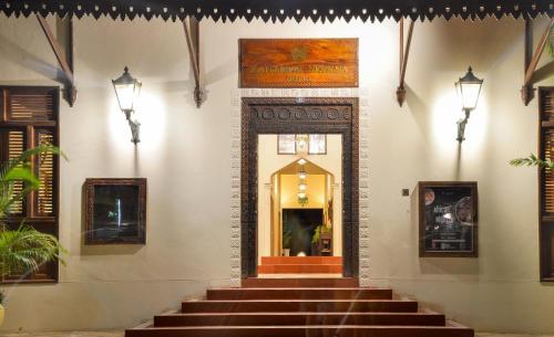 a stairway leading to a door in a building at Zanzibar Serena Hotel in Zanzibar City