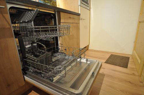 Kärnten Appartementsにあるキッチンまたは簡易キッチン