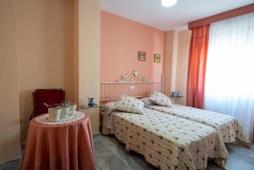 Postel nebo postele na pokoji v ubytování Casa Montesol
