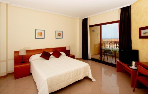 Кровать или кровати в номере Hotel Playasol