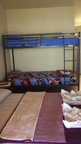 Una cama o camas en una habitación de Emy Studios