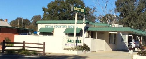 a sign for a mercy country music restaurant at Glenrowan Kelly Country Motel in Glenrowan