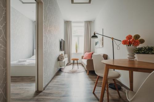 Posezení v ubytování ZEUS Design Apartments Sweet Home