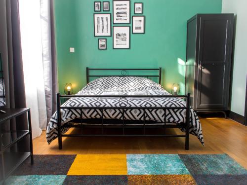 Кровать или кровати в номере Trankil'Apparts Centre