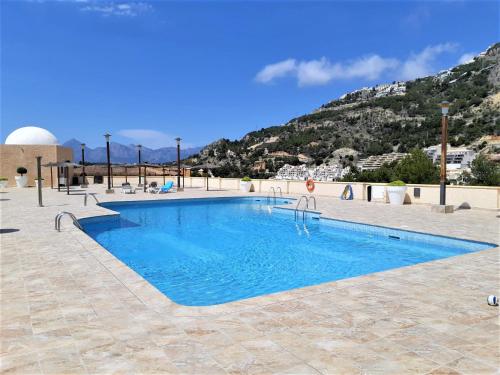 The swimming pool at or close to Atico con Impresionantes Vistas