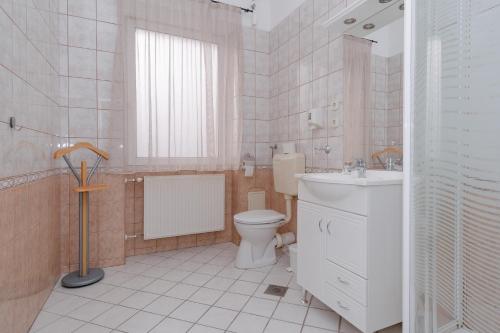 Ванная комната в Oázis Panzió****