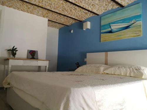 Ένα ή περισσότερα κρεβάτια σε δωμάτιο στο A casa di Ninuccia