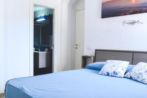 Een bed of bedden in een kamer bij Ai due leoni