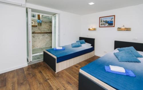 Postel nebo postele na pokoji v ubytování Apartment Bellovar