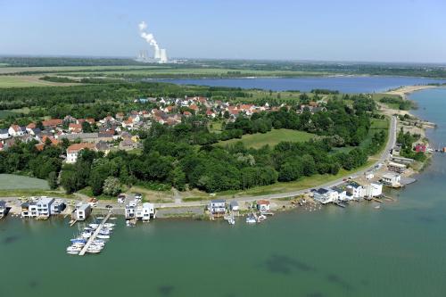 an aerial view of a harbor with boats in the water at Laguna Seeappartements in Neukieritzsch