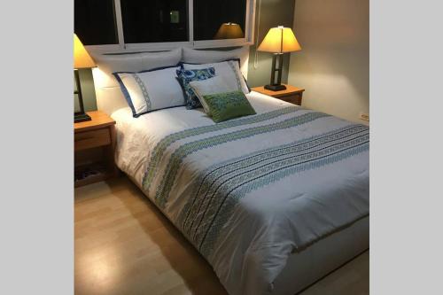 Postel nebo postele na pokoji v ubytování Marbella Malecon