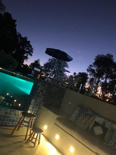 Πισίνα στο ή κοντά στο Hortensias Pousada Boutique - Piscina Aquecida 37 Graus e Fire Pit a Gas - Aceita PET