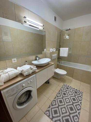 Koupelna v ubytování Apartament Drewno i Morze