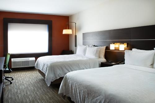 a hotel room with two beds and a window at Holiday Inn Express & Suites - Wentzville St Louis West by IHG in Wentzville