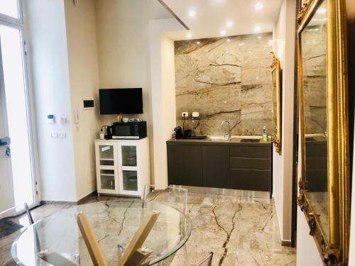 Cucina o angolo cottura di Dimora Umberto Apartment
