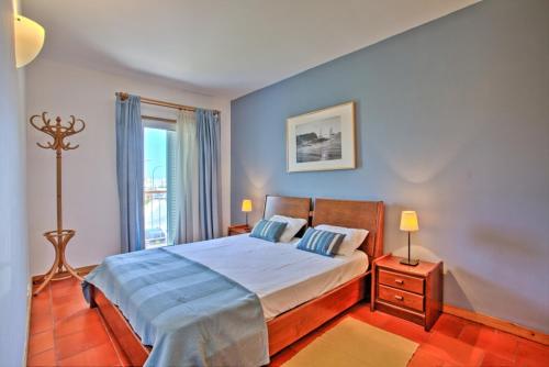 Ένα ή περισσότερα κρεβάτια σε δωμάτιο στο Marina-G