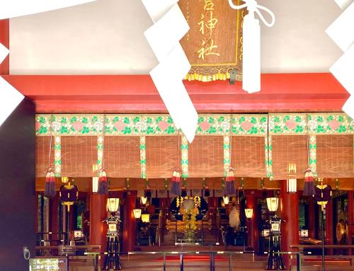 a chinese temple with a sign hanging from the ceiling at Woody house in Nakano