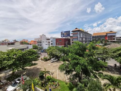 a view of a city with trees and buildings at Subhamitra Hotel Hua Hin-SHA Certified in Hua Hin