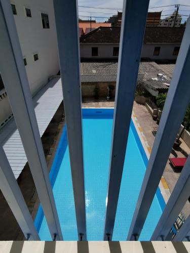 a view of a swimming pool from the balcony of a building at Subhamitra Hotel Hua Hin-SHA Certified in Hua Hin