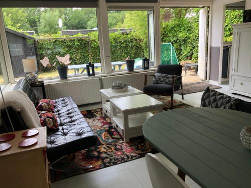 Ruang duduk di Vakantiehuis Lara