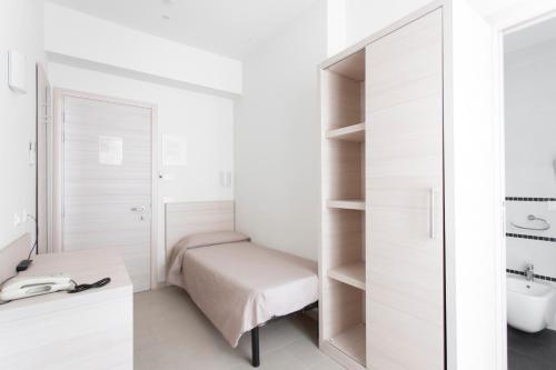 Koupelna v ubytování Hotel Primiana