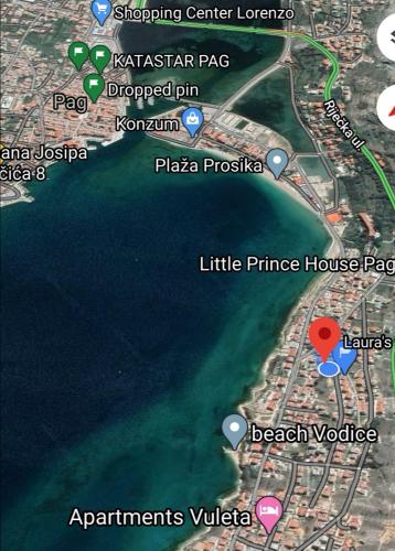 a map of the shoreline of a beach at Laura's dream Appartments in Pag