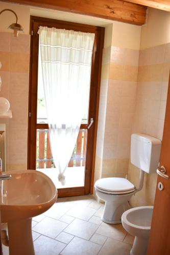 Koupelna v ubytování Residence La Pineta